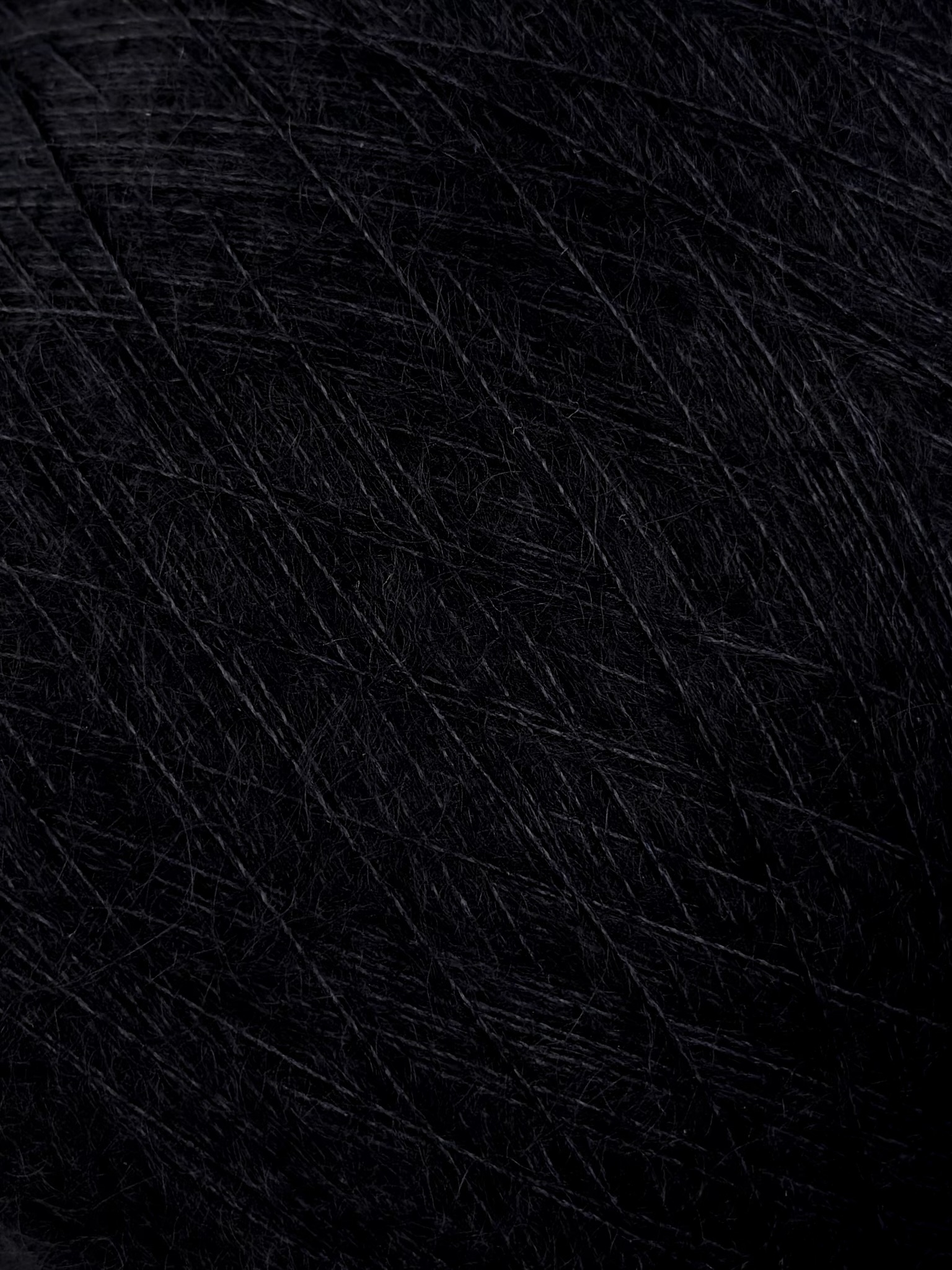 Manifattura Sesia Art. Paris Nm 15.000 – Garn 60 % Super Kid Mohair RMS 40 % Mulberry Seide col. Schwarz 0067